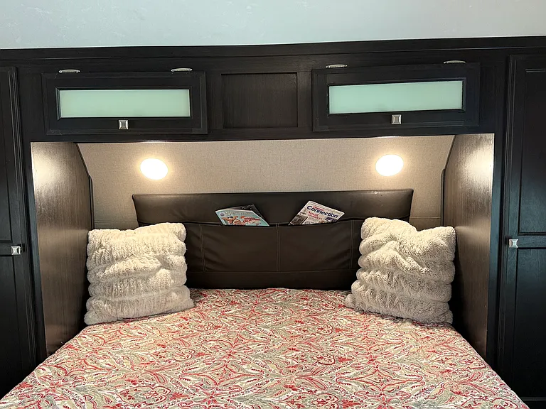 Queen bed with New 10" Memory Foam Gel mattress. Supplemental closet space in designer shed outside