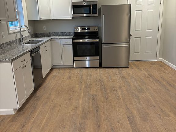 Kitchen and entry from garage.