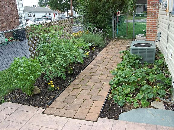 Side yard looking towards front.