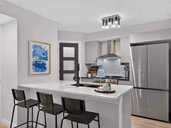 241 NE McKenzie Towne Ln SE, Calgary, AB T2Z 0C4