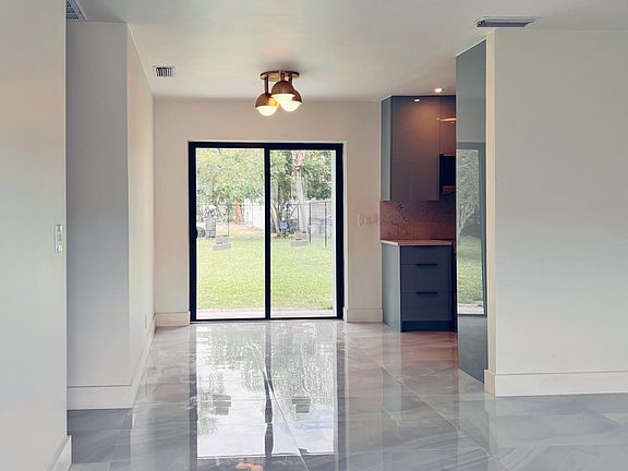 Dining Room Area and Back Patio Door