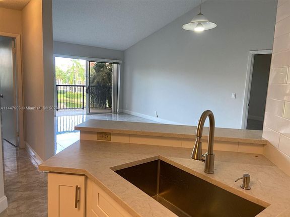 4th image of 9001 Wiles Rd APT 306