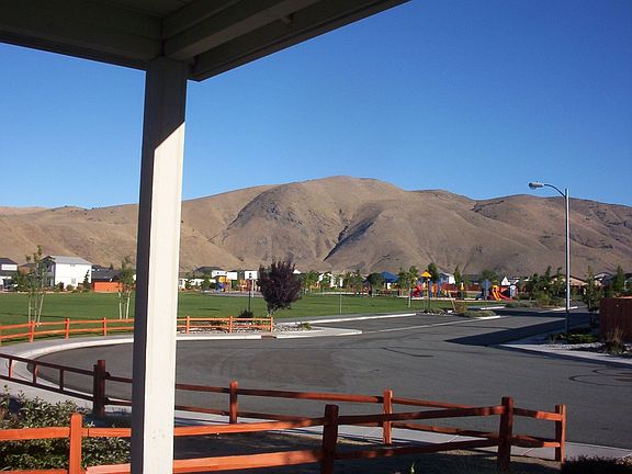 View of park and mountains from porch