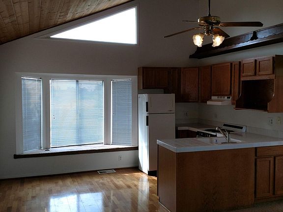 Kitchen/dining area with view of the park/lake