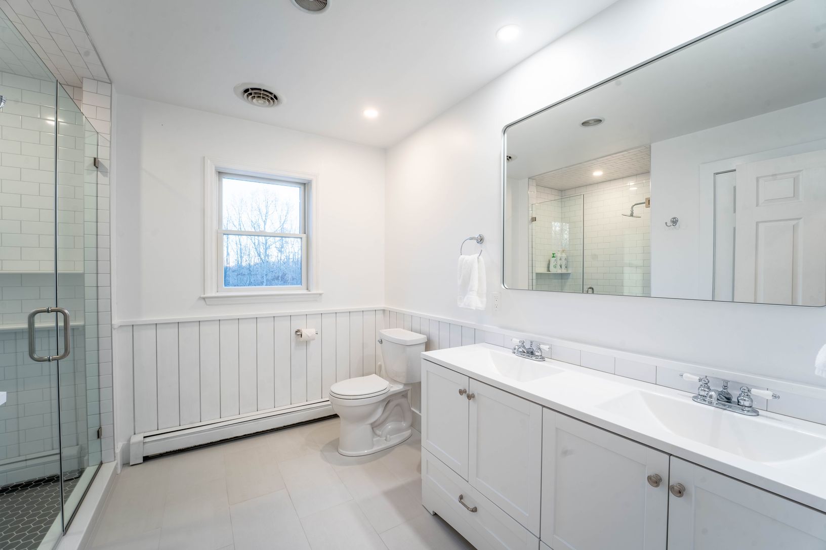  second story full bath, newly renovated with large shower and heated floors