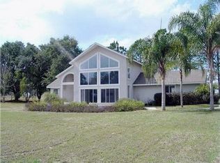 12900 Honey Blossom Dr, Grand Island, FL 32735