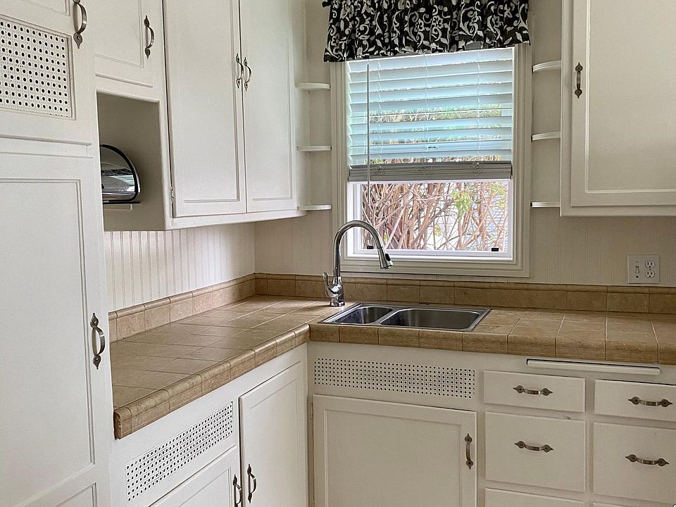 Kitchen is very Clean and everything works well. New countertops, stainless steel sink with garbage disposal. New moen faucet with sprayer.
