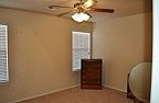 Open floor plan with a large entry . Living area has a tried ceiling and tons of