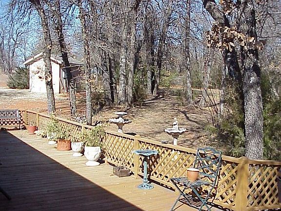 View of back deck and well house.