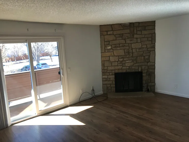 Fireplace with sliding door to balcony