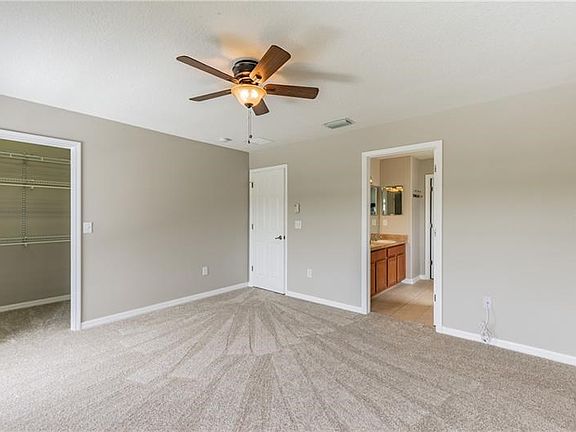 Master bedroom with large en suite bathroom.