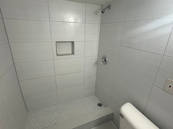 Shower view of bathroom.