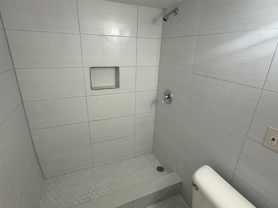 Shower view of bathroom.