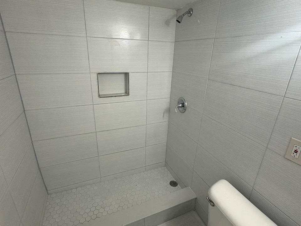 Shower view of bathroom.