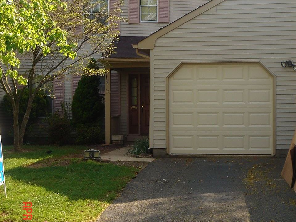 Exterior front newly painted, new garage doors