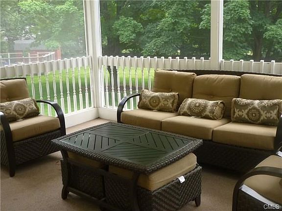 Generous size screened in porch with vaulted ceiling