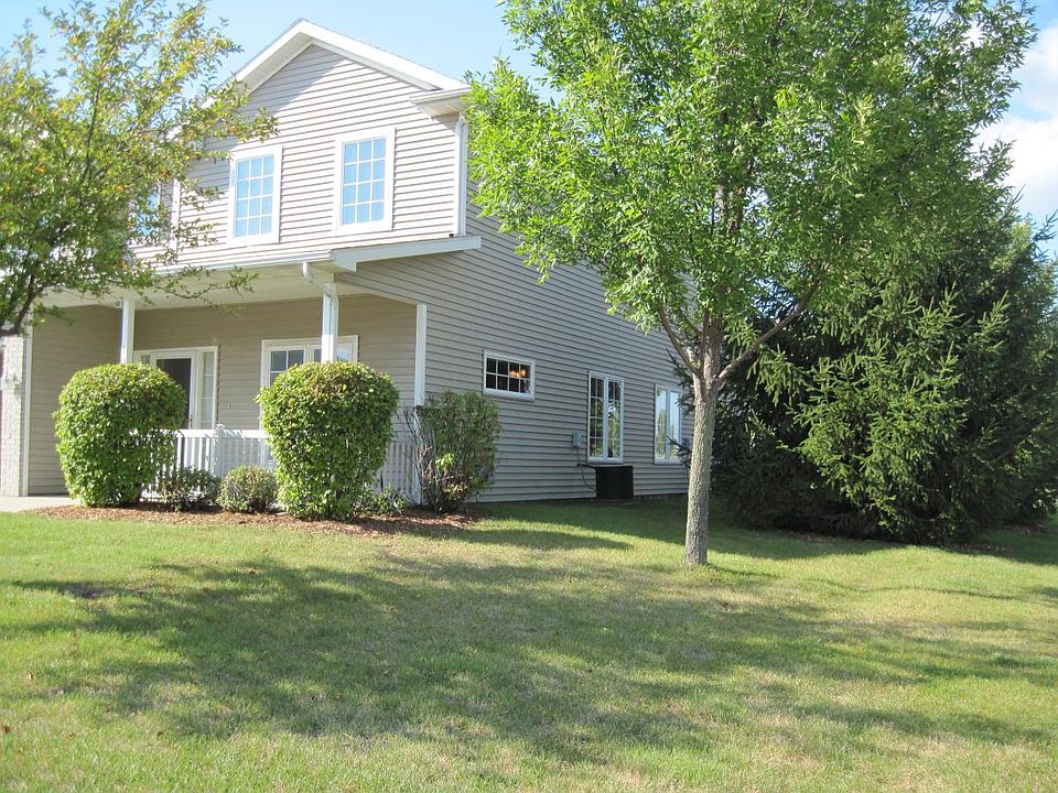 End Unit with extra windows and side yard.