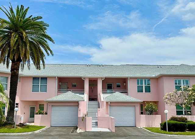 Short set of steps to 2nd floor unit. Nice front porch to enjoy evenings on.