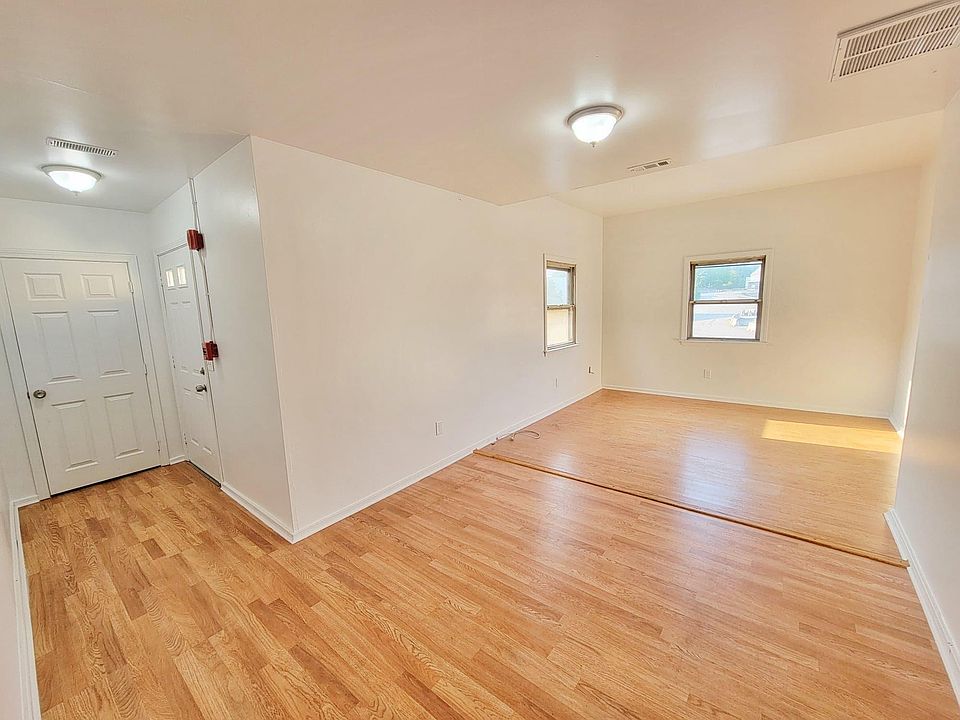 Open dining and living space, entry with coat closet
