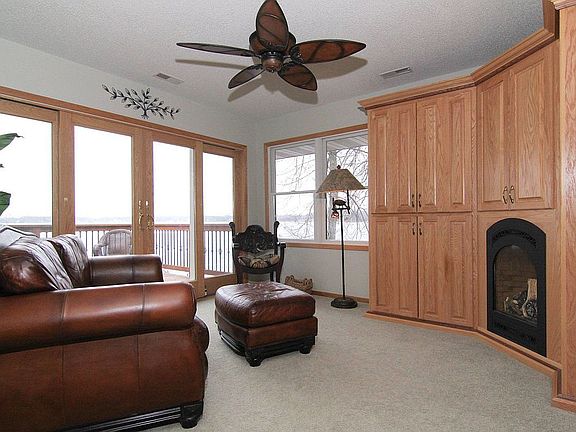 Upper level family room/loft with deck and gas fireplace