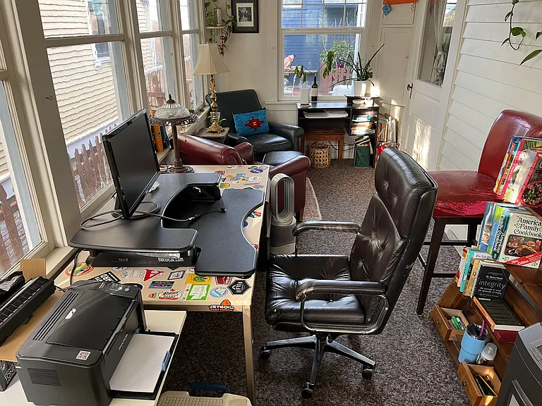 Office | Bright, calming, and configured for remote work including: wired internet connection, office desk and chair, monitor, printer, and 2 comfy Barcaloungers.