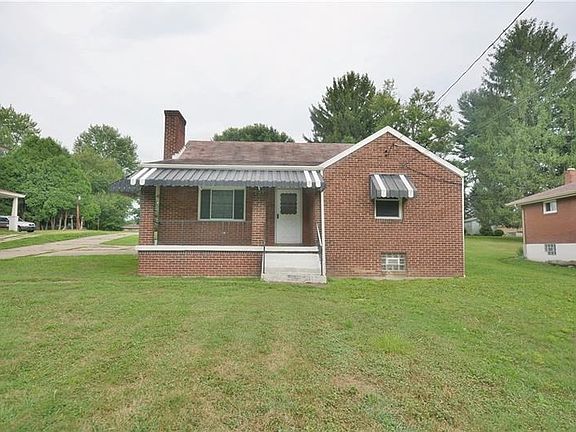 This quaint front porch is great to relax and sip some lemonade on a summer day.
