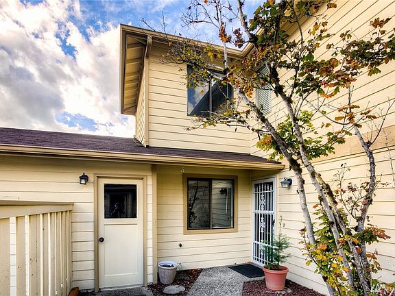 With 1 car attached garage, extra parking in driveway,  private entrance with tons of space for gardening this home is a must see.