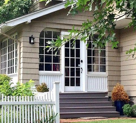 Front sunroom/office access to yard.