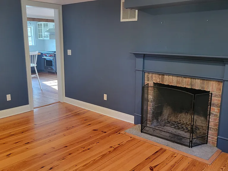 Living room with view to kitchen