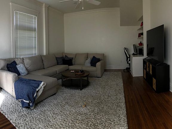 Very large living area with built in bookshelving