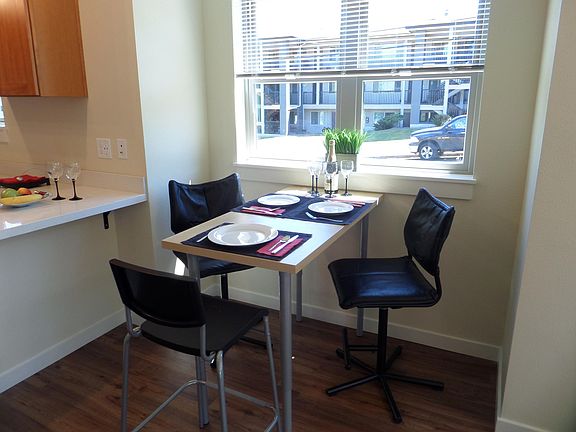 This space will handle a larger table if desired