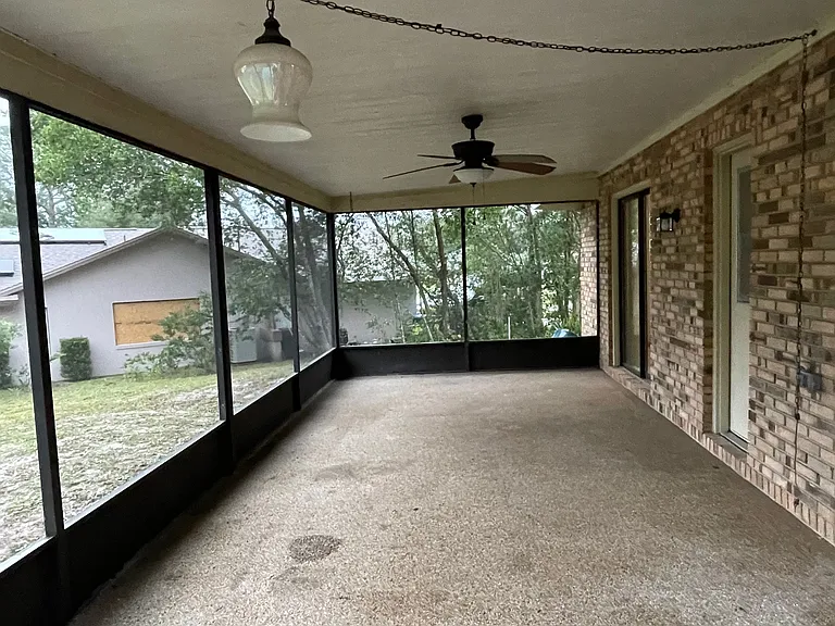 Covered screen porch - Slider to master bedroom and "pool" door to master bathroom.
