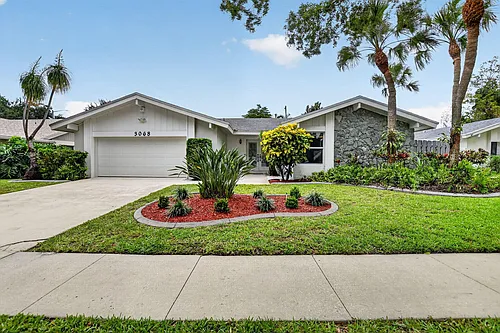3068 NW 25th Way Photo 1
