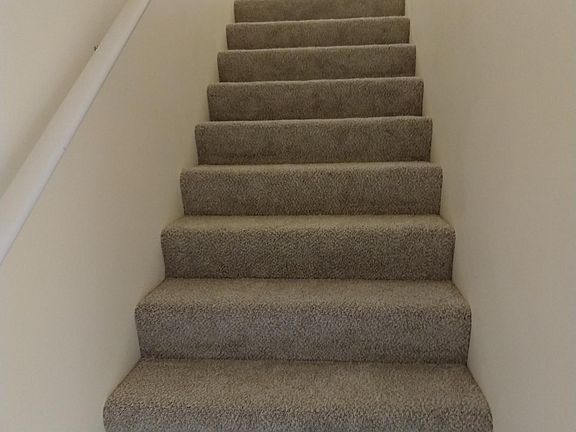 stairs to the upstairs bedroom and bath