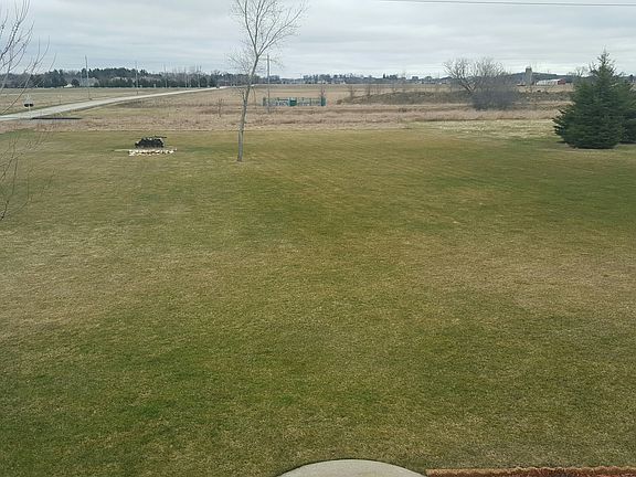 Large backyard with firepit