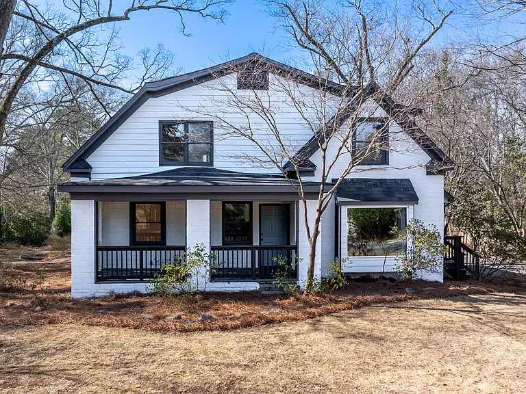 Fully renovated 1930s duplex with historic character, oversized porches, and modern finishes. Walkable to Emory, CDC, and Whole Foods.