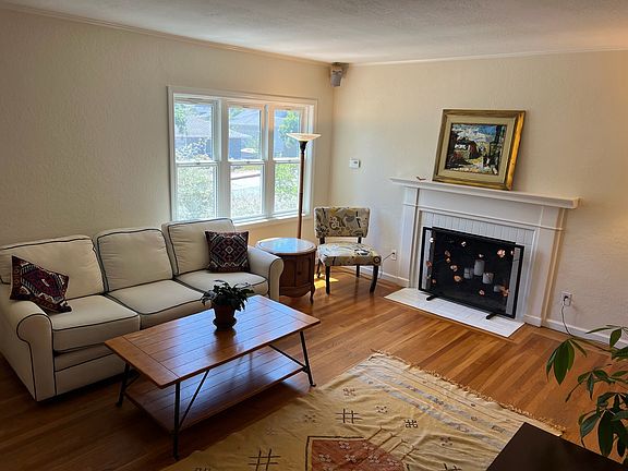 Open living room that merges into the dining area.