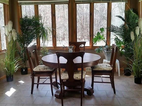 Sun Room with Tiled Floor & Ceiling Fan