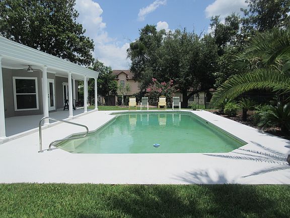 Open Pool and Covered Porch