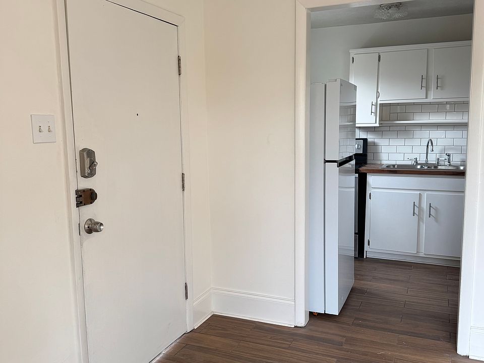 Front door and kitchen view