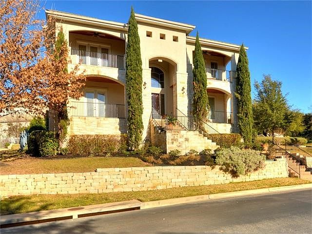 This stunning home in gated area of The Greens in River Place is ready for you! Balconies which give