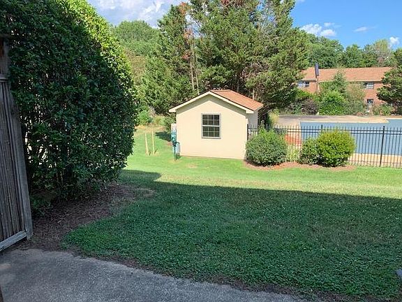 Yard area behind the unit.