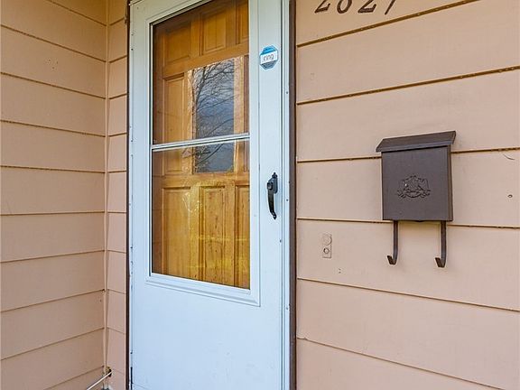 Welcome! Solid oak front door and storm door.