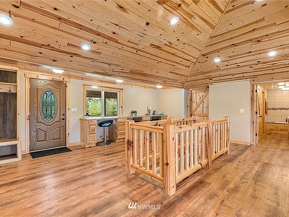 Spacious entry with work space and built ins