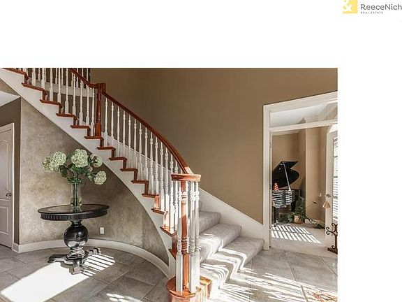 Entry with Tile and New Designer Staircase Carpet