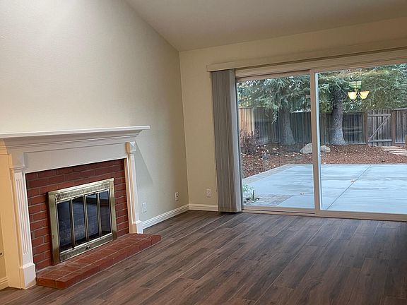 Living room with simulated-wood porcelain tile flooring