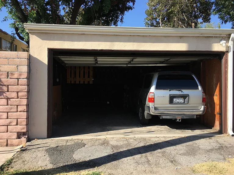 share one car space in a 2 car garage