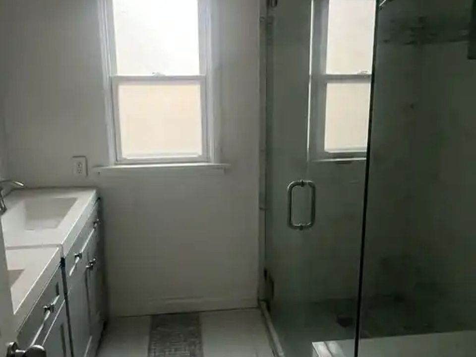 1st bathroom, with double sink.