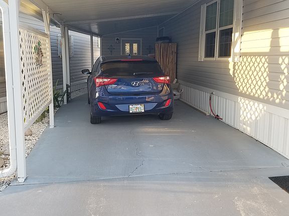 Left side w/carport