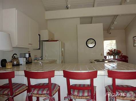 kitchen counter dining to right in back